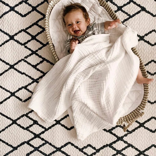 CozyNest Swaddle – Organic Muslin Baby Blanket