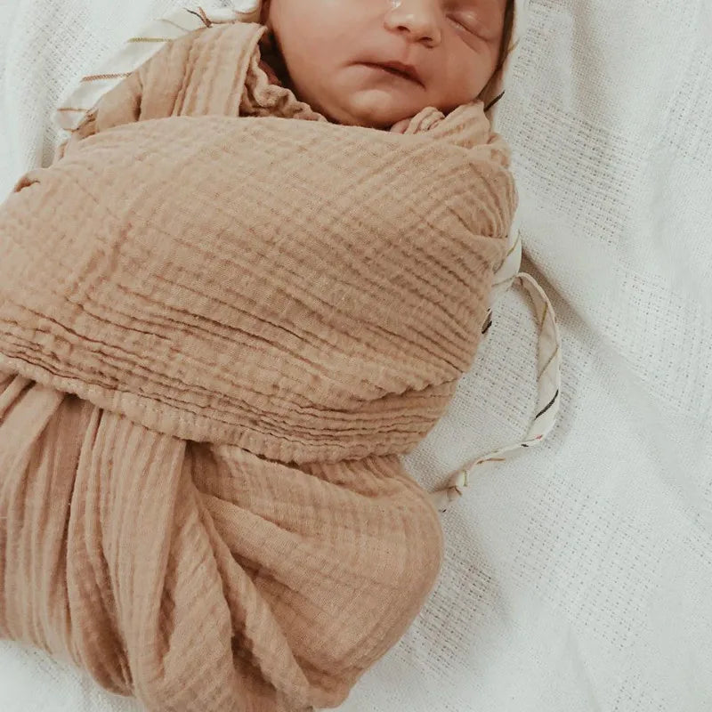 CozyNest Swaddle – Organic Muslin Baby Blanket