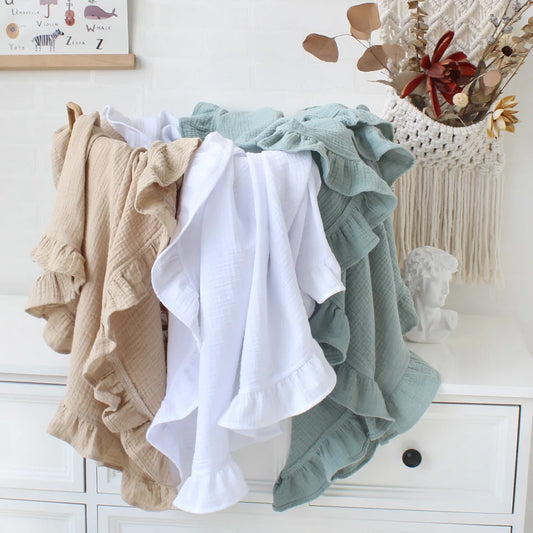 CozyNest Swaddle – Ruffle Organic Cotton Baby Blanket