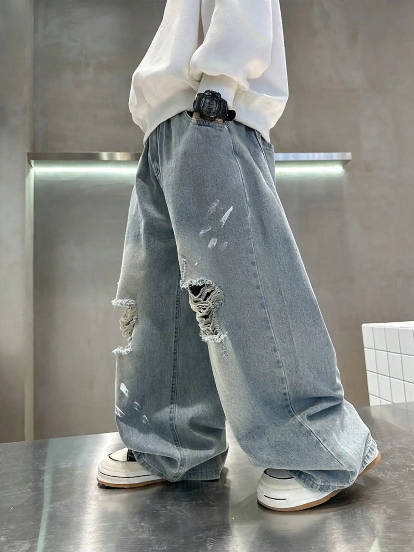 loose and distressed denim wide leg pants for young children in autumn