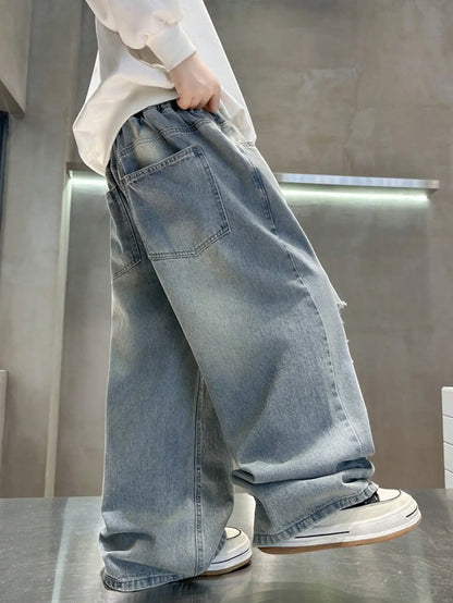 loose and distressed denim wide leg pants for young children in autumn